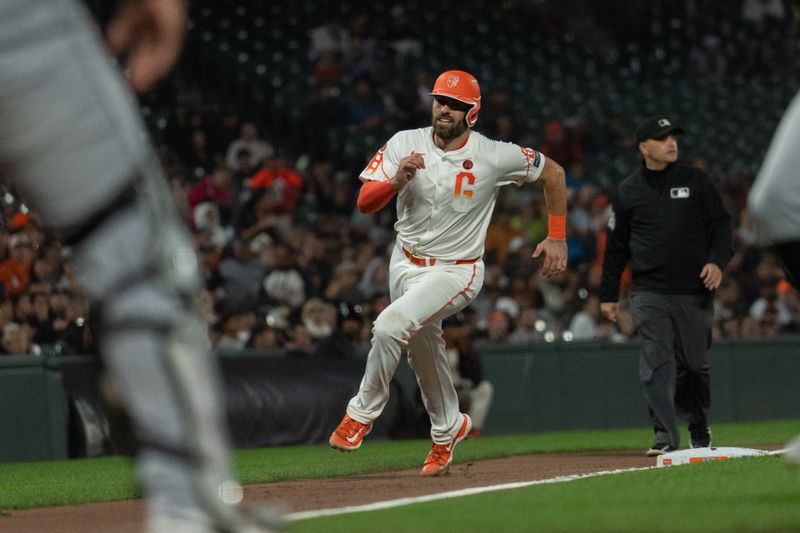 Aug 20, 2024; San Francisco, California, USA;  San Francisco Giants catcher Curt Casali (2) runs towards home plate during the fifth inning against the Chicago White Sox at Oracle Park. Mandatory Credit: Stan Szeto-USA TODAY Sports