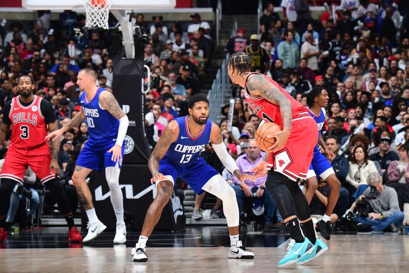 LOS ANGELES, CA - MARCH 9: Paul George #13 of the LA Clippers plays defense during the game against the Chicago Bulls on March 9, 2024 at Crypto.Com Arena in Los Angeles, California. NOTE TO USER: User expressly acknowledges and agrees that, by downloading and/or using this Photograph, user is consenting to the terms and conditions of the Getty Images License Agreement. Mandatory Copyright Notice: Copyright 2024 NBAE (Photo by Adam Pantozzi/NBAE via Getty Images)