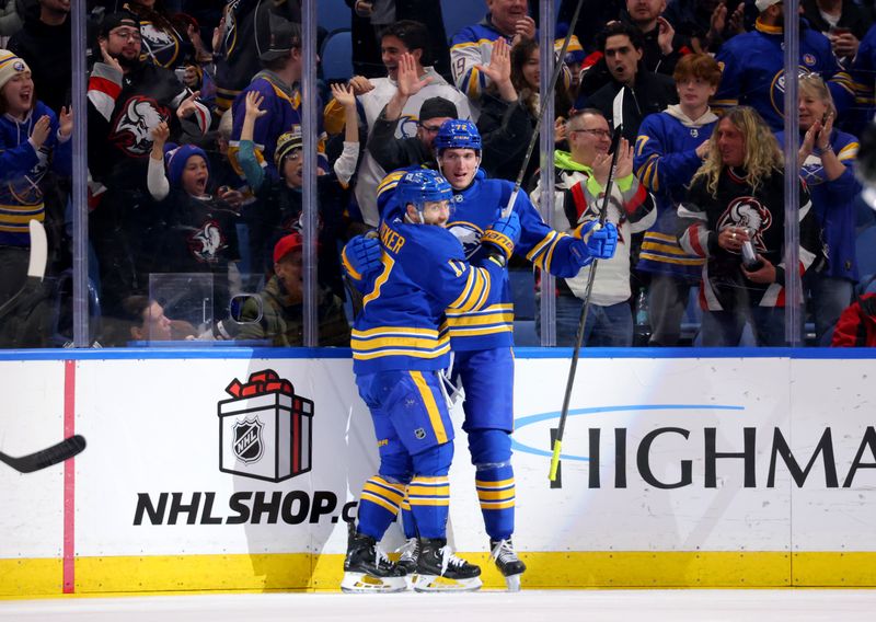 Dec 3, 2024; Buffalo, New York, USA;  Buffalo Sabres center Tage Thompson (72) celebrates his goal with left wing Jason Zucker (17) during the first period against the Colorado Avalanche at KeyBank Center. Mandatory Credit: Timothy T. Ludwig-Imagn Images