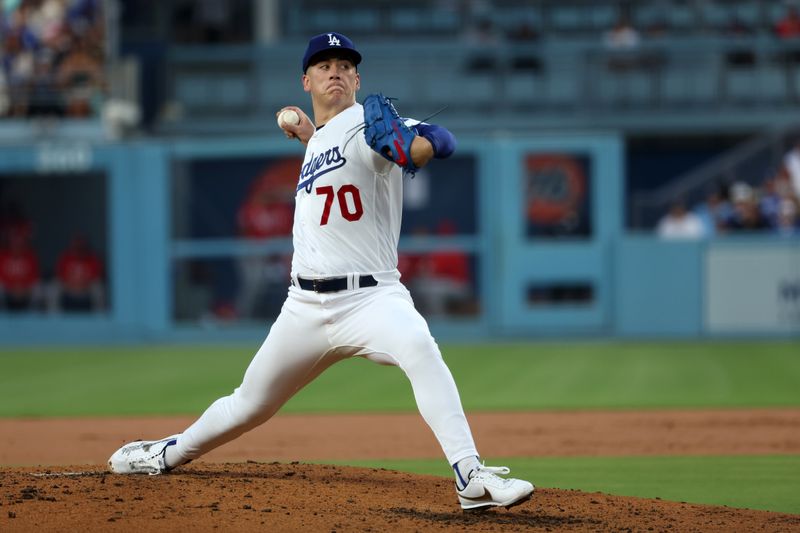 Jul 28, 2023; Los Angeles, California, USA;  Los Angeles Dodgers starting pitcher Bobby Miller (70) pitches during the second inning against the Cincinnati Reds at Dodger Stadium. Mandatory Credit: Kiyoshi Mio-USA TODAY Sports