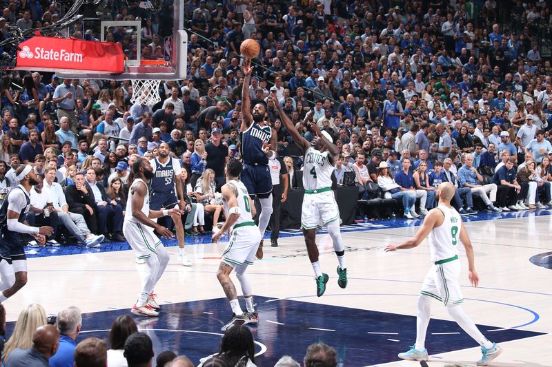 DALLAS, TX - JUNE 12: Kyrie Irving #11 of the Dallas Mavericks drives to the basket during the game against the Boston Celtics during Game 3 of the 2024 NBA Finals on June 12, 2024 at the American Airlines Center in Dallas, Texas. NOTE TO USER: User expressly acknowledges and agrees that, by downloading and or using this photograph, User is consenting to the terms and conditions of the Getty Images License Agreement. Mandatory Copyright Notice: Copyright 2024 NBAE (Photo by Nathaniel S. Butler/NBAE via Getty Images)