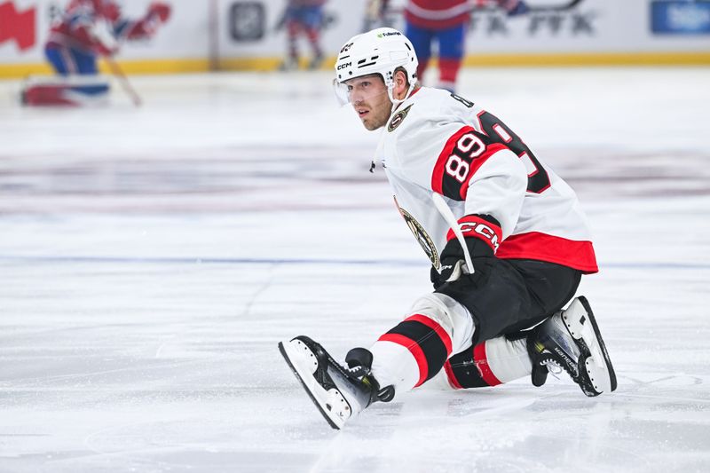 Oct 4, 2025; Montreal, Quebec, CAN; Ottawa Senators center Lars Eller (89) stretches during warm-up before the game against the Montreal Canadiens at Bell Centre. Mandatory Credit: David Kirouac-Imagn Images