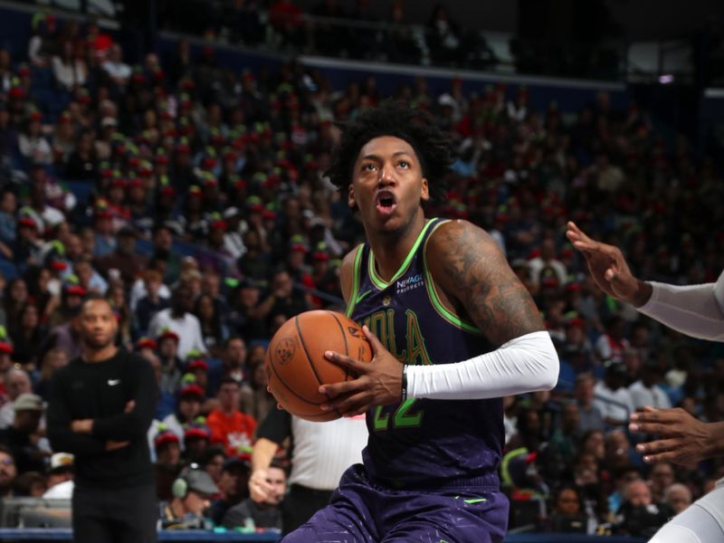 NEW ORLEANS, LA - NOVEMBER 27:   Elfrid Payton #22 of the New Orleans Pelicans drives to the basket during the game against the Toronto Raptors during a regular season game on November 27, 2024 at the Smoothie King Center in New Orleans, Louisiana. NOTE TO USER: User expressly acknowledges and agrees that, by downloading and or using this Photograph, user is consenting to the terms and conditions of the Getty Images License Agreement. Mandatory Copyright Notice: Copyright 2024 NBAE (Photo by Layne Murdoch Jr./NBAE via Getty Images)