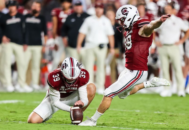 Sep 24, 2022; Columbia, South Carolina, USA; South Carolina Gamecocks place kicker Mitch Jeter (98) kicks a field goal against the Charlotte 49ers in the first quarter at Williams-Brice Stadium. Mandatory Credit: Jeff Blake-USA TODAY Sports