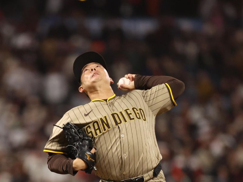 Jun 3, 2025; San Francisco, California, USA;  San Diego Padres relief pitcher Yuki Matsui (1) pitches the ball against the San Francisco Giants during the ninth inning at Oracle Park. Mandatory Credit: Kelley L Cox-Imagn Images