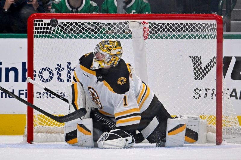 Nov 14, 2024; Dallas, Texas, USA; Boston Bruins goaltender Jeremy Swayman (1) makes a save on a Dallas Stars shot during the third period at the American Airlines Center. Mandatory Credit: Jerome Miron-Imagn Images