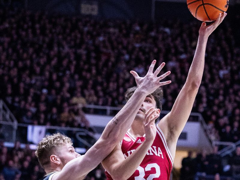 Feb 10, 2024; West Lafayette, Indiana, USA; Indiana Hoosiers guard Trey Galloway (32) shoots the ball while Purdue Boilermakers forward Caleb Furst (1) defends in the first half at Mackey Arena. Mandatory Credit: Trevor Ruszkowski-USA TODAY Sports