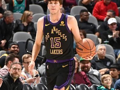 SAN ANTONIO, TX - DECEMBER 15:  Austin Reaves #15 of the Los Angeles Lakers handles the ball during the game  on December 15, 2023 at the Frost Bank Center in San Antonio, Texas. NOTE TO USER: User expressly acknowledges and agrees that, by downloading and or using this photograph, user is consenting to the terms and conditions of the Getty Images License Agreement. Mandatory Copyright Notice: Copyright 2023 NBAE (Photos by Andrew D. Bernstein/NBAE via Getty Images)