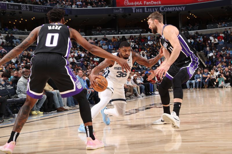 MEMPHIS, TN - DECEMBER 5: Marcus Smart #36 of the Memphis Grizzlies handles the ball during the game against the Sacramento Kings on December 5, 2024 at FedExForum in Memphis, Tennessee. NOTE TO USER: User expressly acknowledges and agrees that, by downloading and or using this photograph, User is consenting to the terms and conditions of the Getty Images License Agreement. Mandatory Copyright Notice: Copyright 2024 NBAE (Photo by Joe Murphy/NBAE via Getty Images)