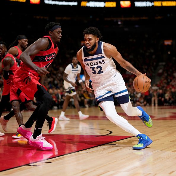 TORONTO, CANADA - OCTOBER 25: Karl-Anthony Towns #32 of the Minnesota Timberwolves drives to the basket during the game against the Toronto Raptors on October 25, 2023 at the Scotiabank Arena in Toronto, Ontario, Canada.  NOTE TO USER: User expressly acknowledges and agrees that, by downloading and or using this Photograph, user is consenting to the terms and conditions of the Getty Images License Agreement.  Mandatory Copyright Notice: Copyright 2023 NBAE (Photo by Mark Blinch/NBAE via Getty Images)