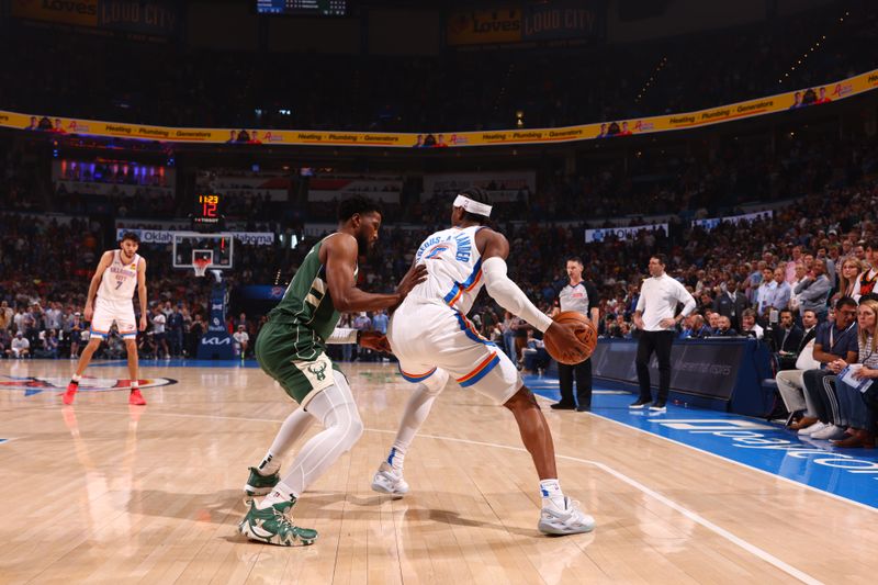 OKLAHOMA CITY, OK - APRIL 12: Shai Gilgeous-Alexander #2 of the Oklahoma City Thunder handles the ball during the game against the Milwaukee Bucks on April 12, 2024 at Paycom Arena in Oklahoma City, Oklahoma. NOTE TO USER: User expressly acknowledges and agrees that, by downloading and or using this photograph, User is consenting to the terms and conditions of the Getty Images License Agreement. Mandatory Copyright Notice: Copyright 2024 NBAE (Photo by Zach Beeker/NBAE via Getty Images)