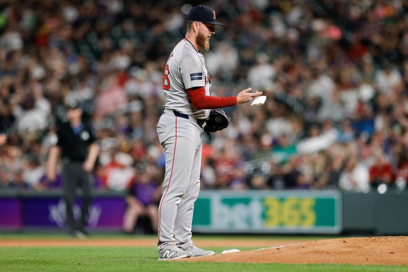 Jul 22, 2024; Denver, Colorado, USA; Boston Red Sox relief pitcher Zack Kelly (76) in the tenth inning against the Colorado Rockies at Coors Field. Mandatory Credit: Isaiah J. Downing-USA TODAY Sports