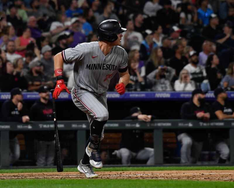 Sep 30, 2023; Denver, Colorado, USA; Minnesota Twins right fielder Max Kepler (26) hits a three run home run in the sixth inning against the Colorado Rockies at Coors Field. Mandatory Credit: John Leyba-USA TODAY Sports