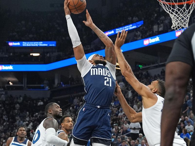 MINNEAPOLIS, MN -  OCTOBER 29: Daniel Gafford #21 of the Dallas Mavericks drives to the basket during the game against the Minnesota Timberwolves on October 29, 2024 at Target Center in Minneapolis, Minnesota. NOTE TO USER: User expressly acknowledges and agrees that, by downloading and or using this Photograph, user is consenting to the terms and conditions of the Getty Images License Agreement. Mandatory Copyright Notice: Copyright 2024 NBAE (Photo by Jordan Johnson/NBAE via Getty Images)