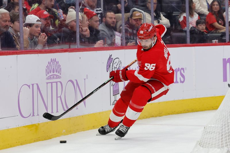 Nov 30, 2023; Detroit, Michigan, USA;  Detroit Red Wings defenseman Jake Walman (96) skates with the puck in the first period against the Chicago Blackhawks at Little Caesars Arena. Mandatory Credit: Rick Osentoski-USA TODAY Sports