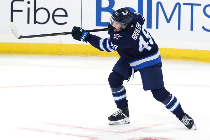 Sep 21, 2024; Winnipeg, Manitoba, CAN; Winnipeg Jets Colby Barlow (49) warms up before a preseason game Minnesota Wild at Canada Life Centre. Mandatory Credit: James Carey Lauder-Imagn Images