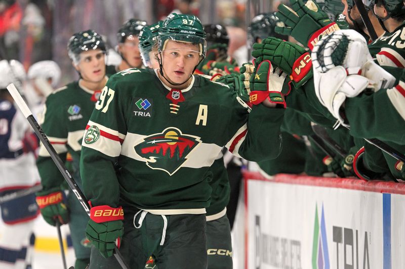 Oct 11, 2025; Saint Paul, Minnesota, USA;  Minnesota Wild forward Kirill Kaprizov (97) celebrates his second goal of the night on the power play against the Columbus Blue Jackets during the third period at Grand Casino Arena. Mandatory Credit: Nick Wosika-Imagn Images