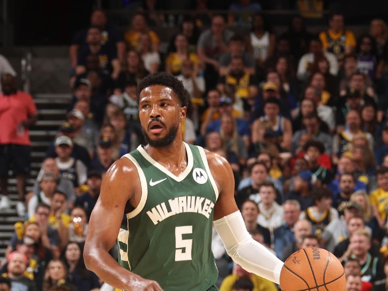 INDIANAPOLIS, IN - APRIL 28: Malik Beasley #5 of the Milwaukee Bucks dribbles the ball during the game against the Indiana Pacers during Round 1 Game 4 of the 2024 NBA Playoffs on April 28, 2024 at Gainbridge Fieldhouse in Indianapolis, Indiana. NOTE TO USER: User expressly acknowledges and agrees that, by downloading and or using this Photograph, user is consenting to the terms and conditions of the Getty Images License Agreement. Mandatory Copyright Notice: Copyright 2024 NBAE (Photo by Nathaniel S. Butler/NBAE via Getty Images)