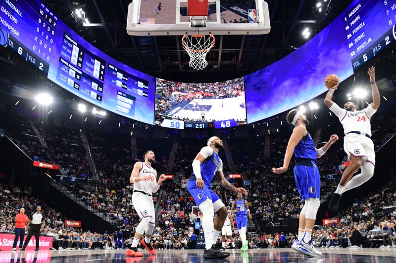 INGLEWOOD, CA - OCTOBER 14: Norman Powell #24 of the LA Clippers shoots the ball during the game against the Dallas Mavericks during a NBA Preseason game on October 14, 2024 at the Intuit Dome in Inglewood, California. NOTE TO USER: User expressly acknowledges and agrees that, by downloading and/or using this Photograph, user is consenting to the terms and conditions of the Getty Images License Agreement. Mandatory Copyright Notice: Copyright 2024 NBAE (Photo by Adam Pantozzi/NBAE via Getty Images)