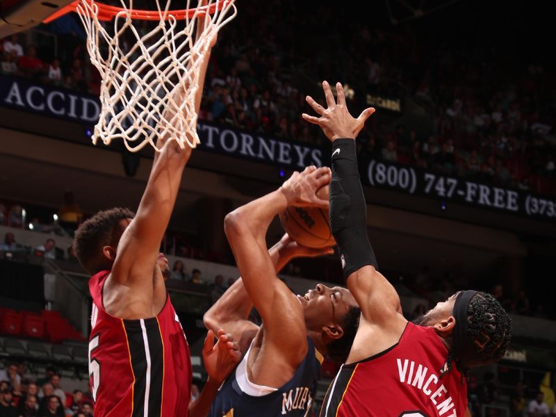 MIAMI, FL - JANUARY 22: Trey Murphy III #25 of the New Orleans Pelicans drives to the basket during the game against the Miami Heat on January 22, 2023 at Miami-Dade Arena in Miami, Florida. NOTE TO USER: User expressly acknowledges and agrees that, by downloading and or using this Photograph, user is consenting to the terms and conditions of the Getty Images License Agreement. Mandatory Copyright Notice: Copyright 2023 NBAE (Photo by Issac Baldizon/NBAE via Getty Images).