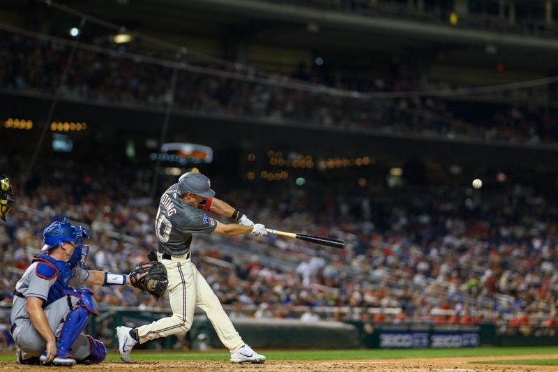 Sep 8, 2023; Washington, District of Columbia, USA; Washington Nationals outfielder Jacob Young (30) hits a double during the fifth inning against the Los Angeles Dodgers at Nationals Park. Mandatory Credit: Reggie Hildred-USA TODAY Sports