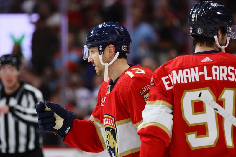 Apr 11, 2024; Sunrise, Florida, USA; Florida Panthers center Sam Reinhart (13) celebrates after scoring against the Columbus Blue Jackets during the second period at Amerant Bank Arena. Mandatory Credit: Sam Navarro-USA TODAY Sports