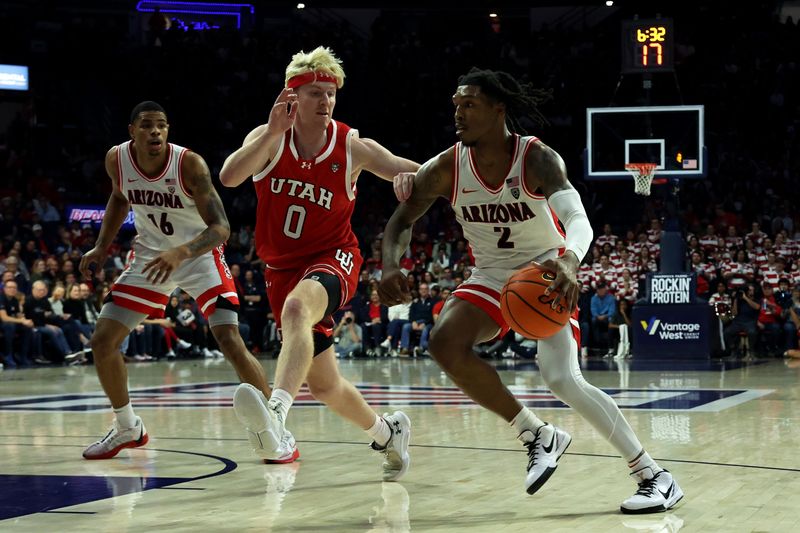 Jan 6, 2024; Tucson, Arizona, USA; Arizona Wildcats guard Caleb Love (2) drives to the net against Utah Utes guard Hunter Erickson (0) during the second half at McKale Center. Mandatory Credit: Zachary BonDurant-USA TODAY Sports