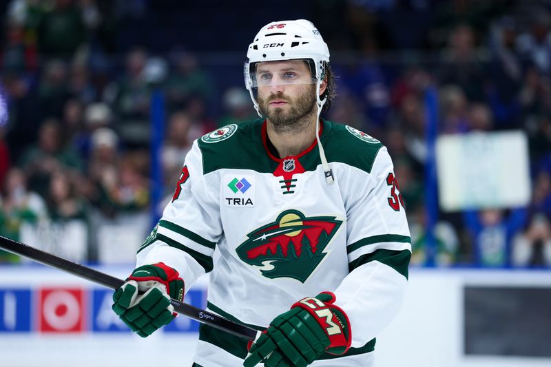 Mar 24, 2026; Tampa, Florida, USA; Minnesota Wild right wing Ryan Hartman (38) warms up before a game against the before a game against the Tampa Bay Lightning at Benchmark International Arena. Mandatory Credit: Nathan Ray Seebeck-Imagn Images