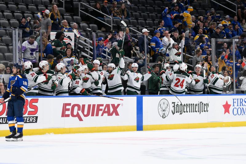 Oct 15, 2024; St. Louis, Missouri, USA; The Minnesota Wild celebrate a goal from Minnesota Wild goaltender Filip Gustavsson (32) against the St. Louis Blues during the third period at Enterprise Center. Mandatory Credit: Jeff Le-Imagn Images