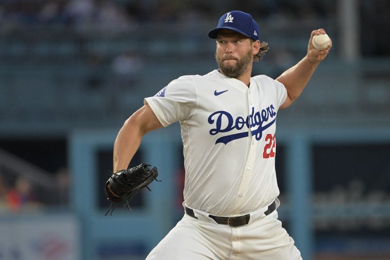 Aug 6, 2024; Los Angeles, California, USA;  Los Angeles Dodgers starting pitcher Clayton Kershaw (22) delivers to the plate in the third inning against the Philadelphia Phillies at Dodger Stadium. Mandatory Credit: Jayne Kamin-Oncea-USA TODAY Sports