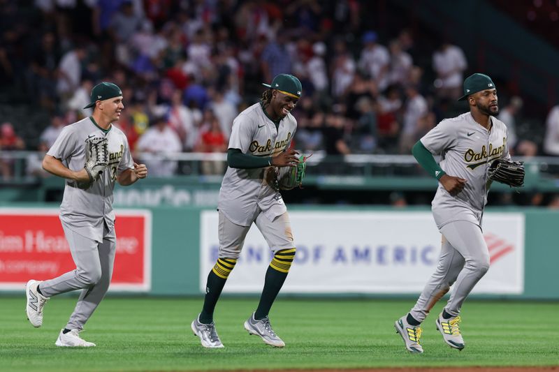 Jul 10, 2024; Boston, Massachusetts, USA; Oakland Athletics right fielder Lawrence Butler (4) reacts after defeating the Boston Red Sox at Fenway Park. Mandatory Credit: Paul Rutherford-USA TODAY Sports