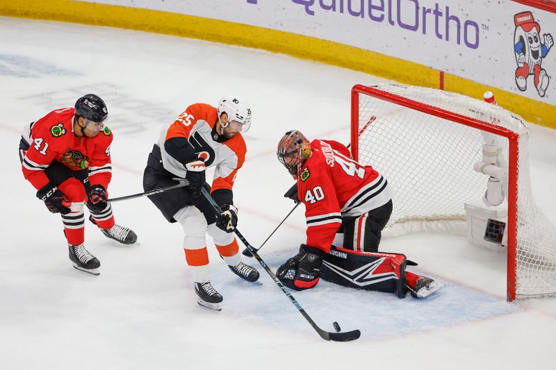 Feb 21, 2024; Chicago, Illinois, USA; Philadelphia Flyers center Ryan Poehling (25) tries to score against the Chicago Blackhawks during the first period at United Center. Mandatory Credit: Kamil Krzaczynski-USA TODAY Sports