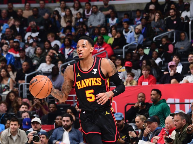 LOS ANGELES, CA - MARCH 17: Dejounte Murray #5 of the Atlanta Hawks dribbles the ball during the game against the LA Clippers on March 17, 2024 at Crypto.Com Arena in Los Angeles, California. NOTE TO USER: User expressly acknowledges and agrees that, by downloading and/or using this Photograph, user is consenting to the terms and conditions of the Getty Images License Agreement. Mandatory Copyright Notice: Copyright 2024 NBAE (Photo by Adam Pantozzi/NBAE via Getty Images)