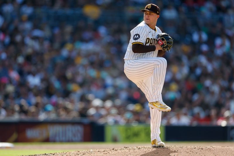 May 27, 2024; San Diego, California, USA; San Diego Padres relief pitcher Adrian Morejon (50) throws a pitch during the sixth inning against the Miami Marlins at Petco Park. Mandatory Credit: David Frerker-USA TODAY Sports