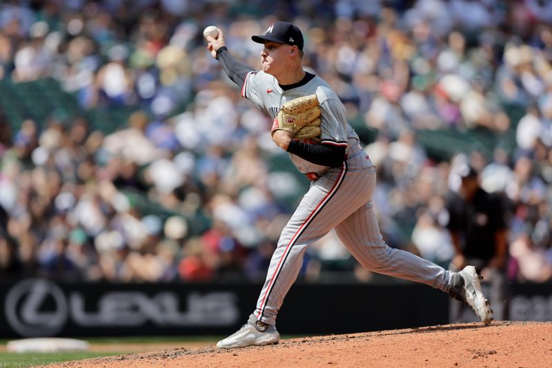 Jun 30, 2024; Seattle, Washington, USA; Minnesota Twins relief pitcher Cole Sands (44) throws against the Seattle Mariners during the seventh inning at T-Mobile Park. Mandatory Credit: John Froschauer-USA TODAY Sports