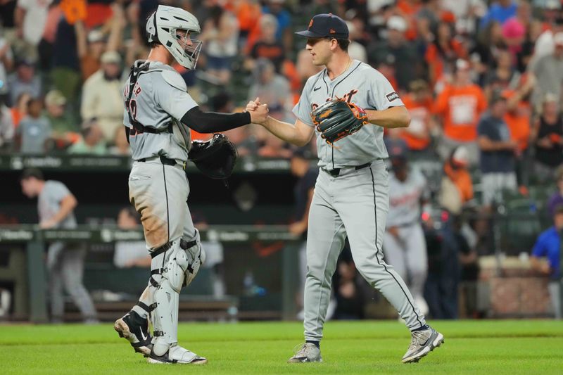 Sep 21, 2024; Baltimore, Maryland, USA; Detroit Tigers catcher Dillon Dingler (left) greets pitcher Beau Brieske (right) after the final out of the game against the Baltimore Orioles at Oriole Park at Camden Yards. Mandatory Credit: Mitch Stringer-Imagn Images