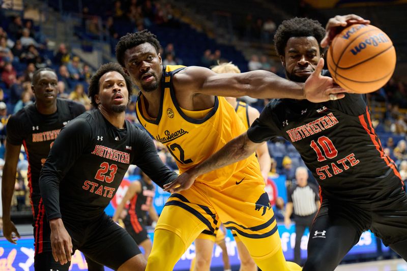 Dec 14, 2024; Berkeley, California, USA; Northwestern State Demons guard Jon Sanders II (10) and forward Willie Williams (23) rebound the ball against California Golden Bears center Mady Sissoko (12) during the first half at Haas Pavilion. Mandatory Credit: Robert Edwards-Imagn Images
