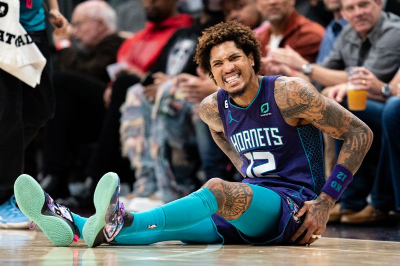 CHARLOTTE, NORTH CAROLINA - NOVEMBER 05: Kelly Oubre Jr. #12 of the Charlotte Hornets reacts after being fouled in the third quarter during their game against the Brooklyn Nets at Spectrum Center on November 05, 2022 in Charlotte, North Carolina. NOTE TO USER: User expressly acknowledges and agrees that, by downloading and or using this photograph, User is consenting to the terms and conditions of the Getty Images License Agreement. (Photo by Jacob Kupferman/Getty Images)