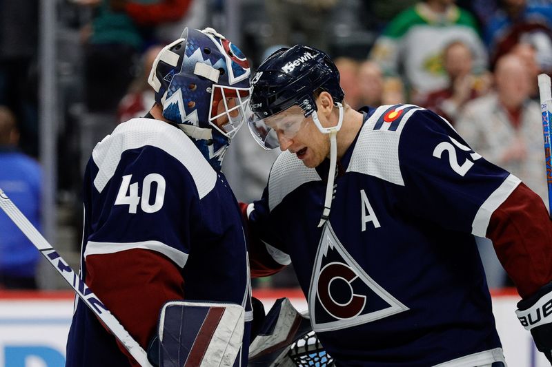 Apr 9, 2024; Denver, Colorado, USA; Colorado Avalanche goaltender Alexandar Georgiev (40) and center Nathan MacKinnon (29) celebrate after the game against the Minnesota Wild at Ball Arena. Mandatory Credit: Isaiah J. Downing-USA TODAY Sports