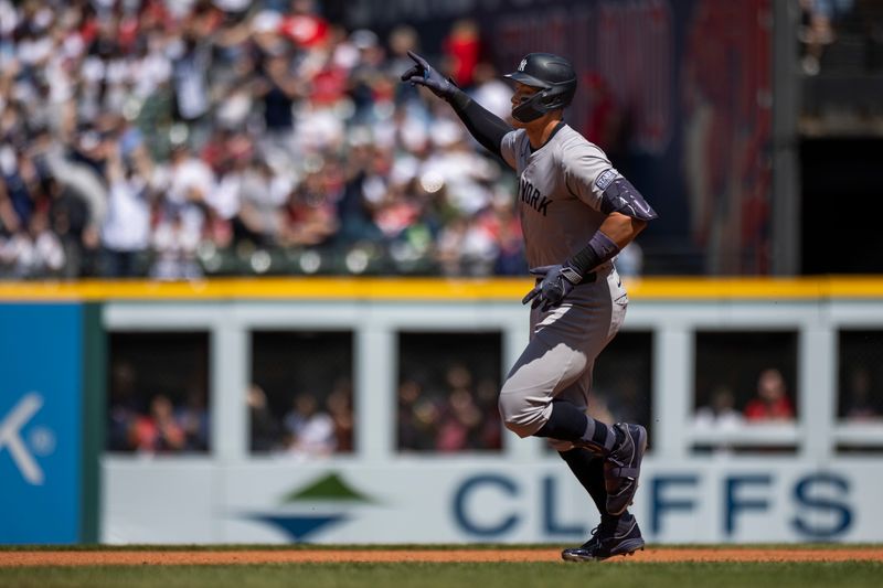 Apr 14, 2024; Cleveland, Ohio, USA; New York Yankees center fielder Aaron Judge (99) celebrates his three-run home run during the third inning against the Cleveland Guardians at Progressive Field. Mandatory Credit: Scott Galvin-USA TODAY Sports