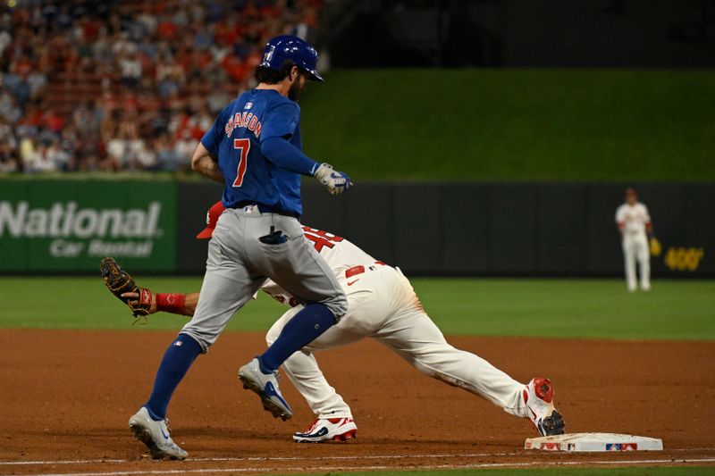 Jul 13, 2024; St. Louis, Missouri, USA; Chicago Cubs shortstop Dansby Swanson (7) is out at first from St. Louis Cardinals first baseman Paul Goldschmidt (46) during the eighth inning at Busch Stadium. Mandatory Credit: Jeff Le-USA TODAY Sports