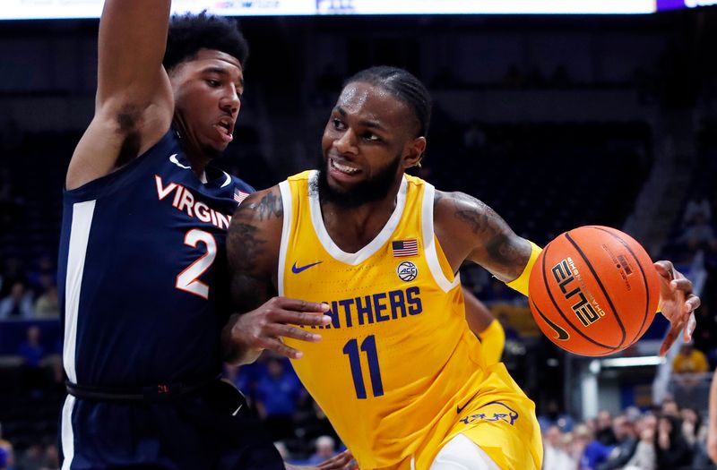 Jan 3, 2023; Pittsburgh, Pennsylvania, USA; Pittsburgh Panthers guard Jamarius Burton (11) dribbles against pressure from Virginia Cavaliers guard Reece Beekman (2) during the second half at the Petersen Events Center. Pittsburgh won 68-65. Mandatory Credit: Charles LeClaire-USA TODAY Sports