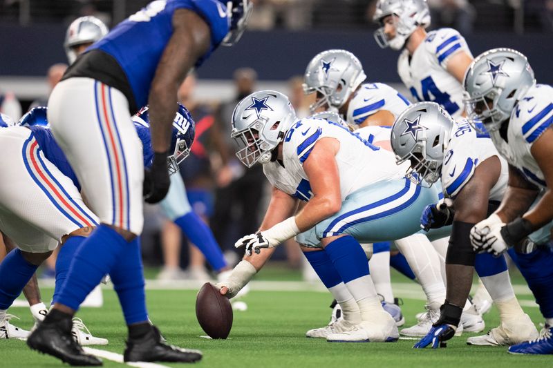 Dallas Cowboys center Brock Hoffman prepares to snap the ball during the second half of an NFL football game between the Dallas Cowboys and the New York Giants, Sunday, Nov. 12, 2023, in Arlington, Texas. The Cowboys won 49-17. (AP Photo/Julio Cortez)