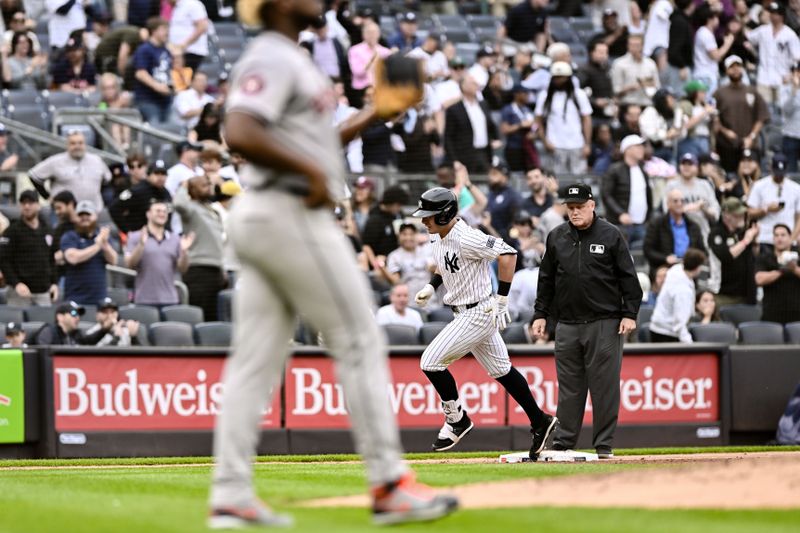 May 9, 2024; Bronx, New York, USA; New York Yankees shortstop Anthony Volpe (11) rounds the bases after hitting a two run home run against the Houston Astros during the third inning at Yankee Stadium. Mandatory Credit: John Jones-USA TODAY Sports