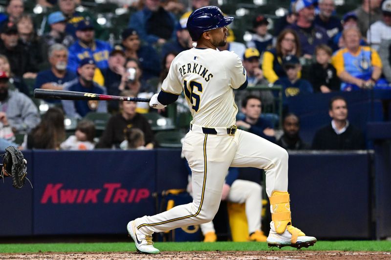 Apr 17, 2024; Milwaukee, Wisconsin, USA;  Milwaukee Brewers center fielder Blake Perkins (16) hits a single to drive in the game-winning run in the eighth inning against the San Diego Padres at American Family Field. Mandatory Credit: Benny Sieu-USA TODAY Sports