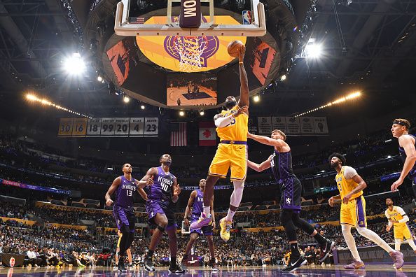 LOS ANGELES, CA - NOVEMBER 15: LeBron James #23 of the Los Angeles Lakers drives to the basket during the game against the Sacramento Kings on November 15, 2023 at Crypto.Com Arena in Los Angeles, California. NOTE TO USER: User expressly acknowledges and agrees that, by downloading and/or using this Photograph, user is consenting to the terms and conditions of the Getty Images License Agreement. Mandatory Copyright Notice: Copyright 2023 NBAE (Photo by Adam Pantozzi/NBAE via Getty Images)