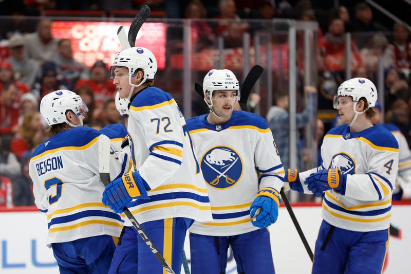 Dec 14, 2024; Washington, District of Columbia, USA; Buffalo Sabres center Jiri Kulich (20) celebrates with teammates after scoring a goal against the Washington Capitals in the second period at Capital One Arena. Mandatory Credit: Geoff Burke-Imagn Images