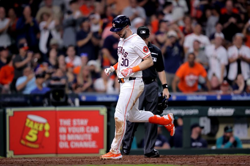 May 5, 2024; Houston, Texas, USA; Houston Astros right fielder Kyle Tucker (30) crosses home plate after hitting a two-run home run against the Seattle Mariners during the sixth inning at Minute Maid Park. Mandatory Credit: Erik Williams-USA TODAY Sports