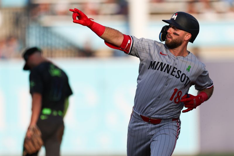 May 27, 2025; Tampa, Florida, USA; Minnesota Twins second baseman Kody Clemens (18) runs the bases after hitting a home run against the Tampa Bay Rays in the second inning at George M. Steinbrenner Field. Mandatory Credit: Nathan Ray Seebeck-Imagn Images