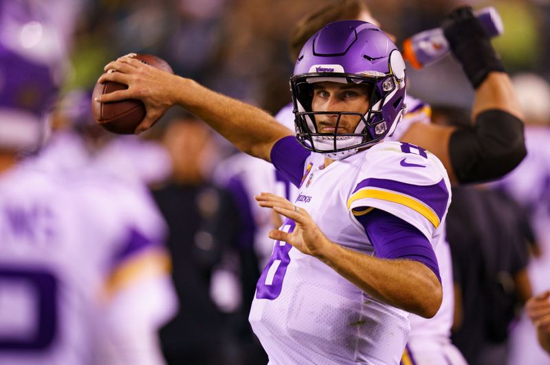 Minnesota Vikings quarterbacks Kirk Cousins (8) in action during the NFL football game against the Philadelphia Eagles, Monday, Sept. 19, 2022, in Philadelphia. (AP Photo/Chris Szagola)